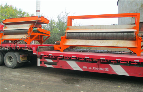 強磁輥式磁選機，上海濕式輥式磁選機工作原理_上海濕式輥式磁選機工作原理如何配置，選三氧化二鐵嗎？